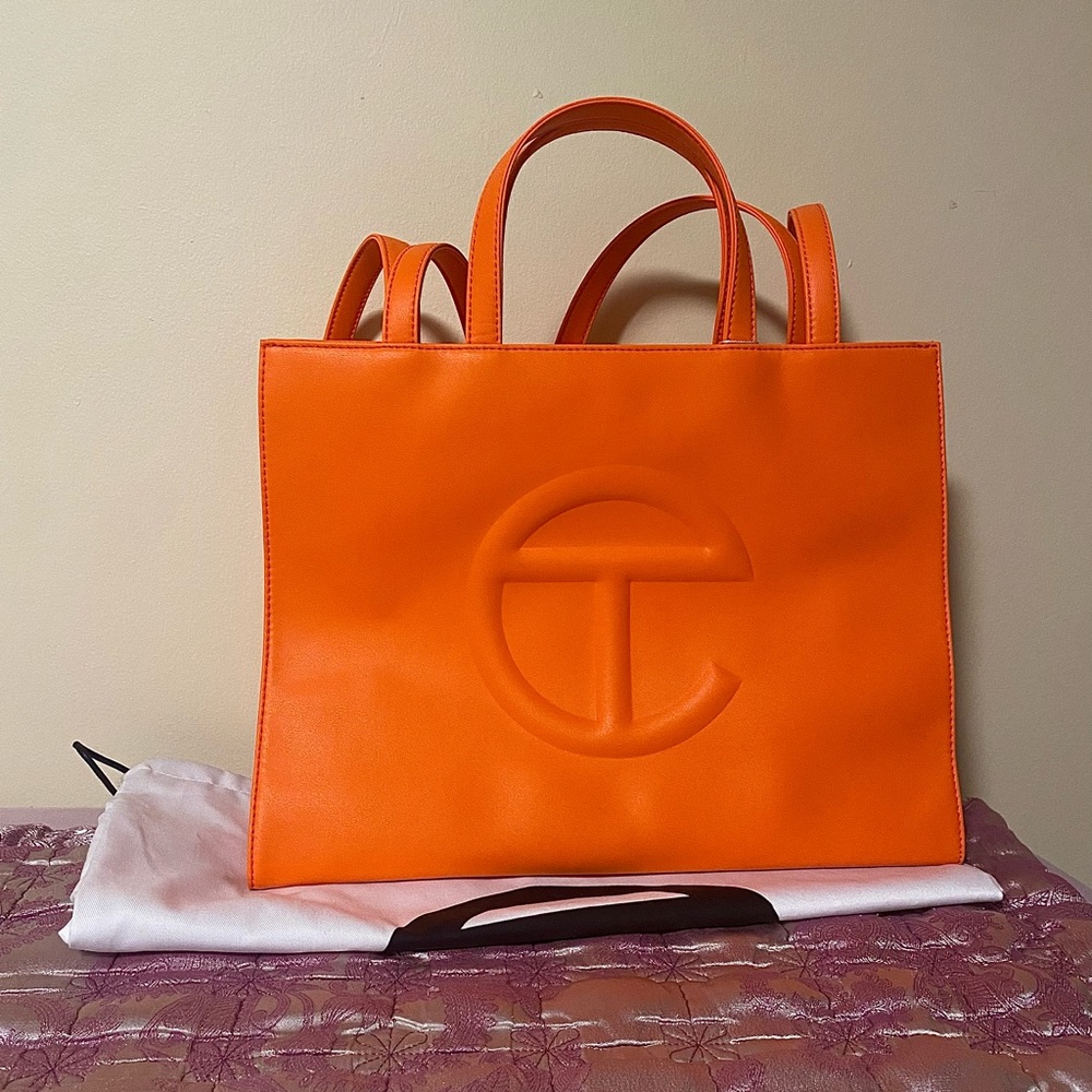 brand new medium orange telfar bag with dustbag
